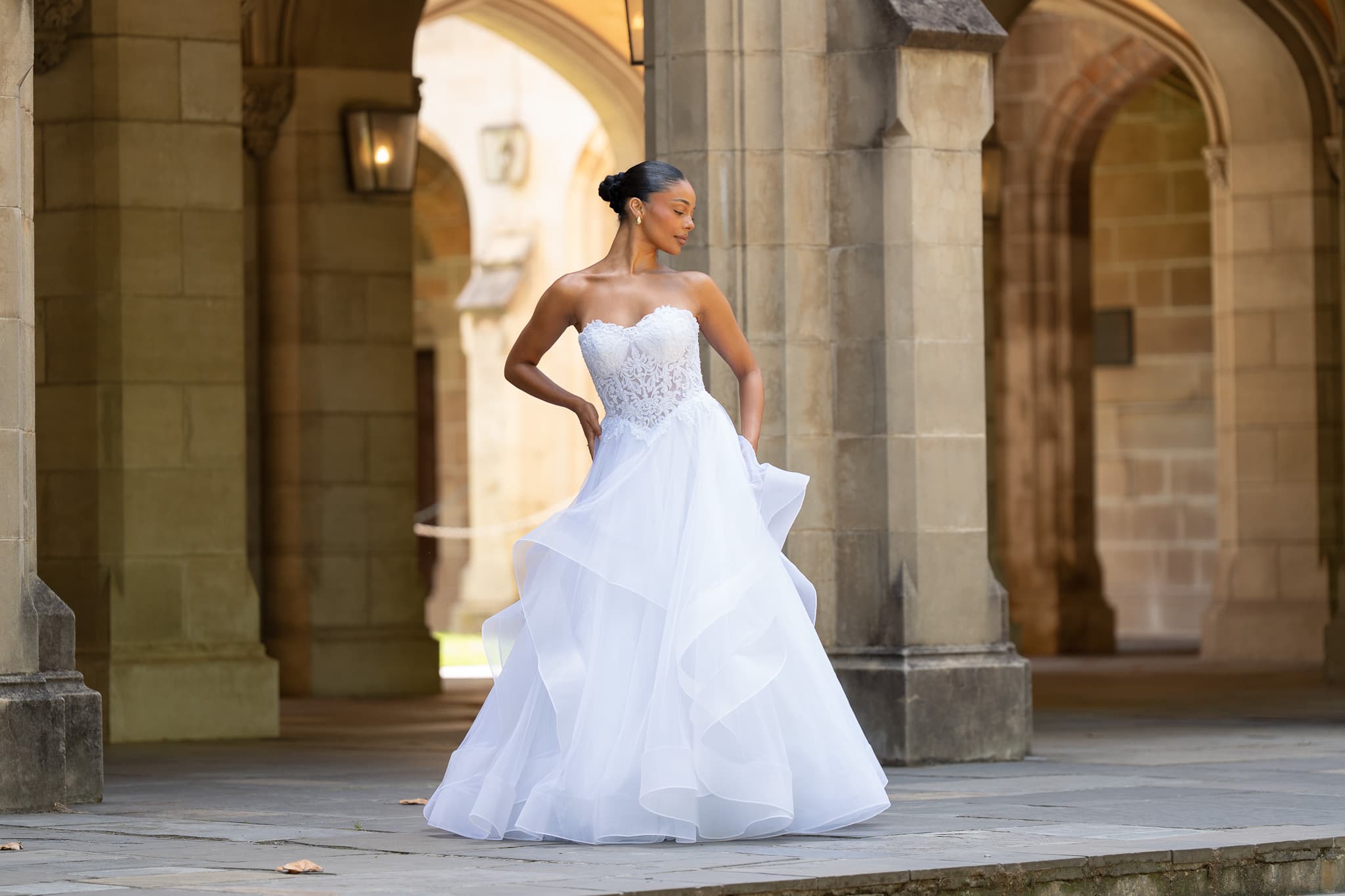 Mid-turn between the piers, the organza folding over itself